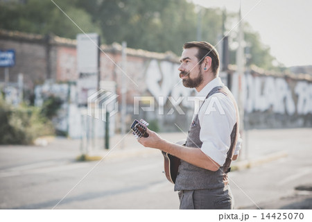 handsome big moustache hipster man playing mandolin handsome big moustache hipster man playing mandolin 14425070