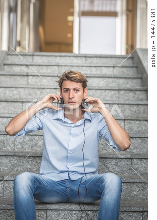 young model hansome blonde man with headphones young model hansome blonde man with headphones 14425381