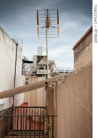 Television antenna on the roof of a house Television antenna on the roof of a house 14425901