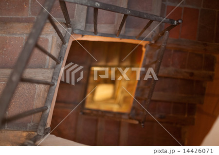Spain, Catalonia, Barcelona, High angle view of a spiral staircase 14426071