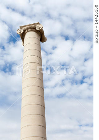 Low angle view of an Ionic column against cloudy sky, Barcelona, Catalonia, Spain 14426160