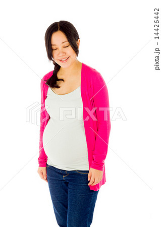 Pregnant asian woman isolated on white laughing 14426442