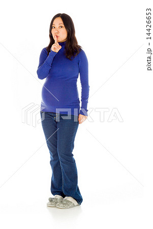 Pregnant asian woman isolated on white with a secret Pregnant asian woman isolated on white with a secret 14426653