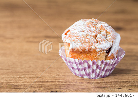 homemade muffins over wooden board selective focus 14456017