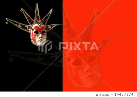 Traditional Venetian mask on a black and red Traditional Venetian mask on a black and red 14457274