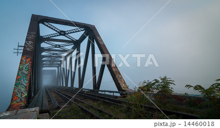 Foggy morning railway bridge. 14460018