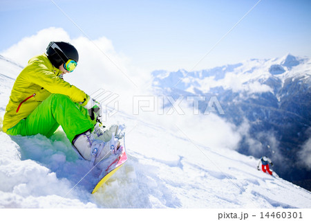 Snowboarder sitting Snowboarder sitting 14460301