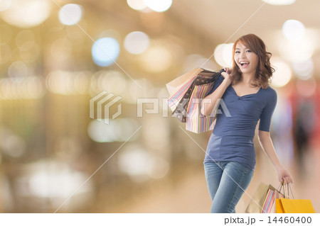 Cheerful shopping woman 14460400