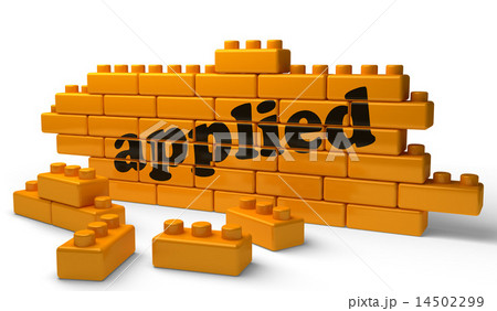 applied word on yellow brick wall 14502299