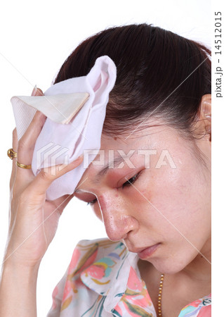 Woman holds an ice pack after nose job Woman holds an ice pack after nose job 14512015
