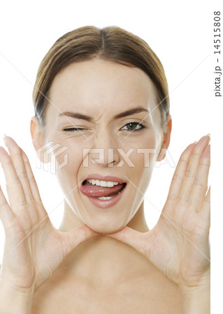 Woman winking with tongue out 14515808