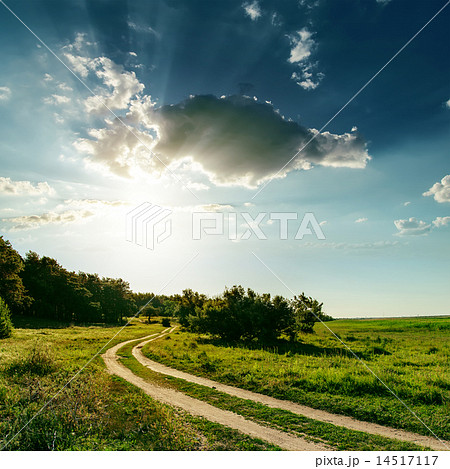 dirty road and sunset over it 14517117