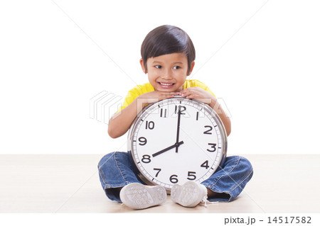 Cute boy holding big clock  14517582