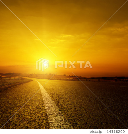 golden sunset over asphalt road golden sunset over asphalt road 14518200