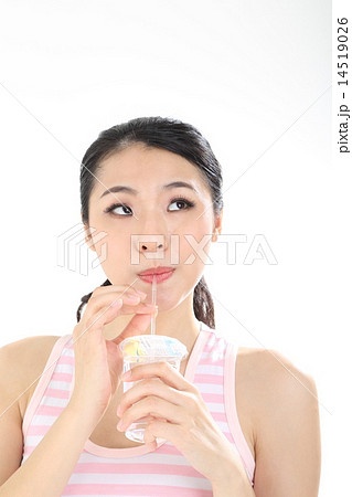 Woman driking water looking up right 14519026