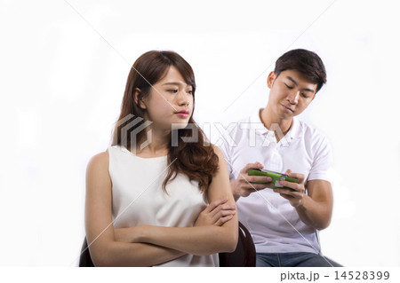 Young lady angry with man neglecting her Young lady angry with man neglecting her 14528399