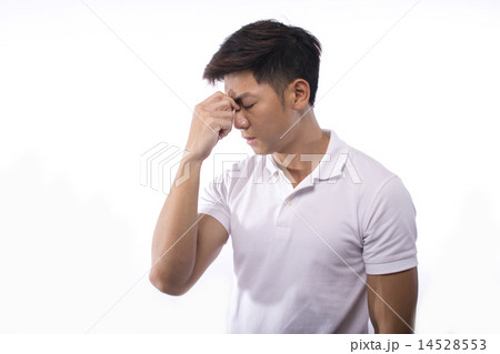 Young man in deep thought 14528553