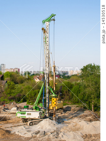 Pile driver at a construction site Pile driver at a construction site 14530518