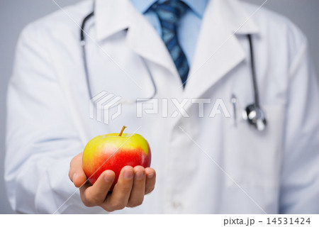 Doctor with an apple 14531424