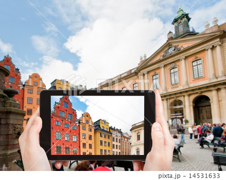 tourist taking photo Stortorget square Stockholm tourist taking photo Stortorget square Stockholm 14531633