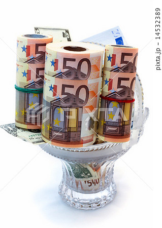 Monetary denominations laid in a vase Monetary denominations laid in a vase 14532389