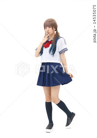 コスプレのセーラー服を着た若い女性の写真素材