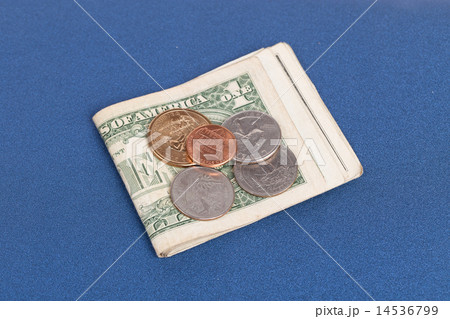 US coins on a blue notebook cover US coins on a blue notebook cover 14536799