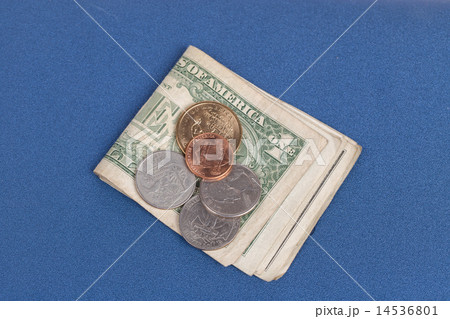US coins on a blue notebook cover 14536801