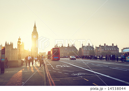people on Westminster Bridge at sunset, London, UK 14538044