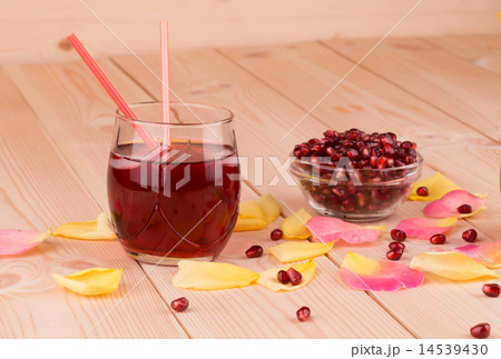Juice and ripe pomegranate grains. Juice and ripe pomegranate grains. 14539430