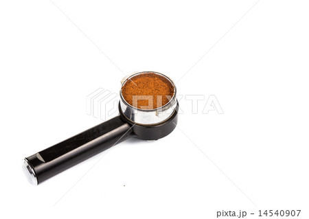 Coffee portafilter filled with finely grounded cof 14540907