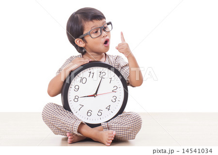 boy is holding big clock 14541034