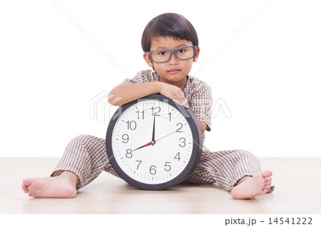 Cute boy is holding big clock Cute boy is holding big clock 14541222