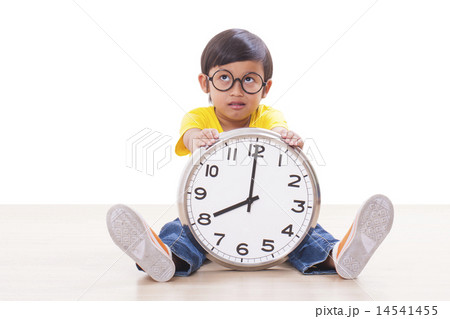 boy is holding big clock  14541455