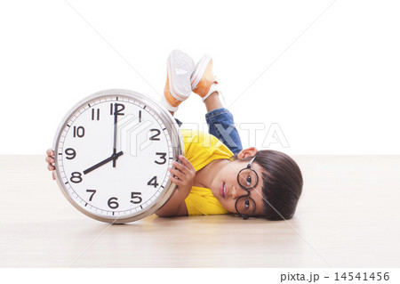 boy is holding big clock  14541456