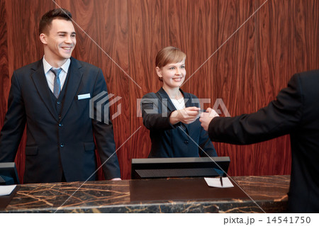 Reception at work in hotel Reception at work in hotel 14541750