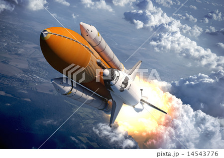 Space Shuttle Flying Over The Clouds 14543776