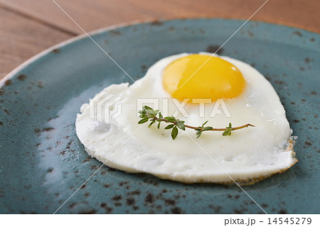 Fried egg in shape of heart Fried egg in shape of heart 14545279