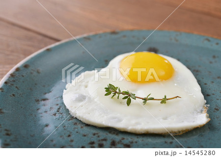 Fried egg in shape of heart Fried egg in shape of heart 14545280