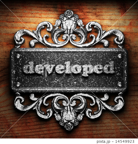 developed word of iron on wooden background 14549923