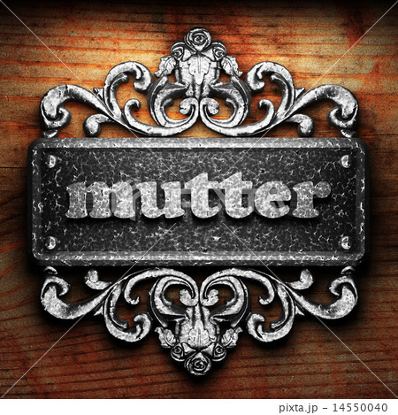 mutter word of iron on wooden background mutter word of iron on wooden background 14550040