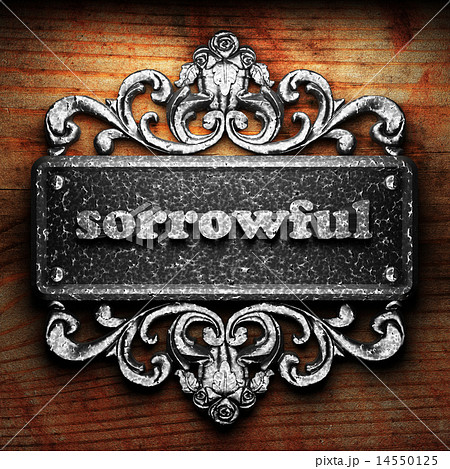sorrowful word of iron on wooden background 14550125