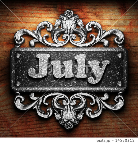 July word of iron on wooden background 14550315