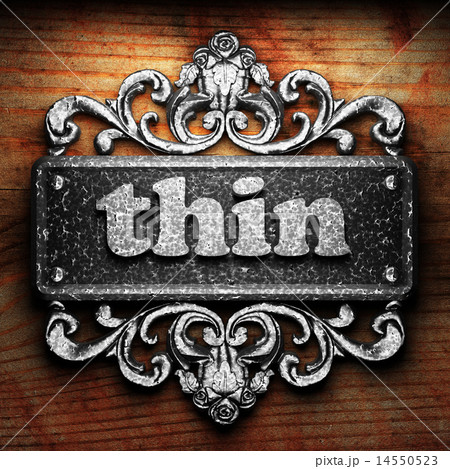 thin word of iron on wooden background 14550523