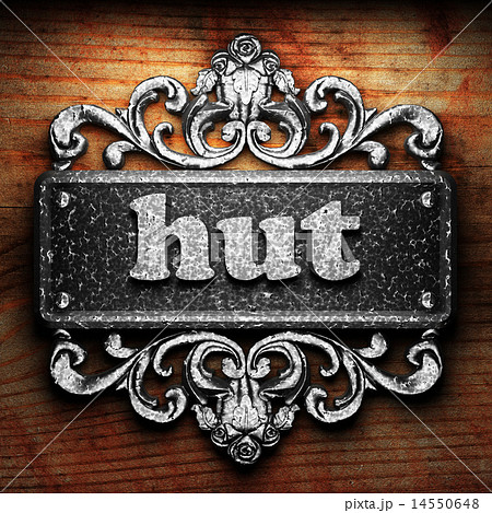 hut word of iron on wooden background 14550648