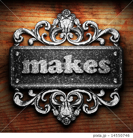 makes word of iron on wooden background 14550746