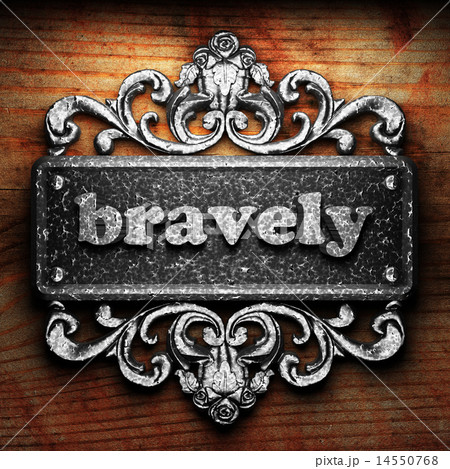 bravely word of iron on wooden background bravely word of iron on wooden background 14550768