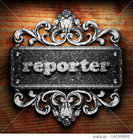reporter word of iron on wooden background 14550995