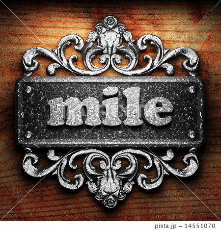 mile word of iron on wooden background mile word of iron on wooden background 14551070