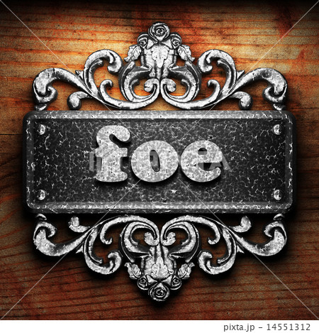 foe word of iron on wooden background foe word of iron on wooden background 14551312